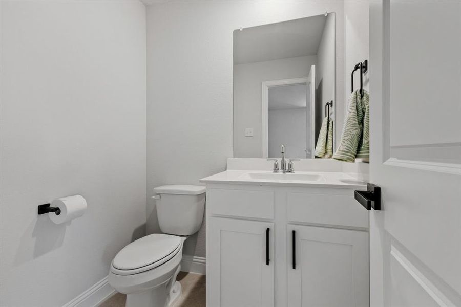 Bathroom with vanity and toilet