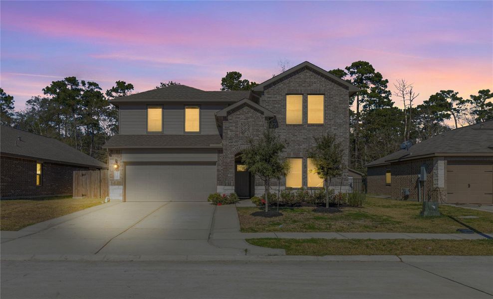 Front exterior of a new home in , Anahuac, TX, highlighting curb appeal (Image 1). Front exterior of a new home in , Anahuac, TX, highlighting curb appeal (Image 1).