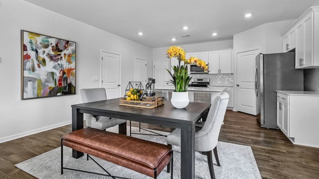 Representative furnished interior of a home built from the Collin by D.R. Horton in The Townes at Anderson Farm, Wendell (Image 13).