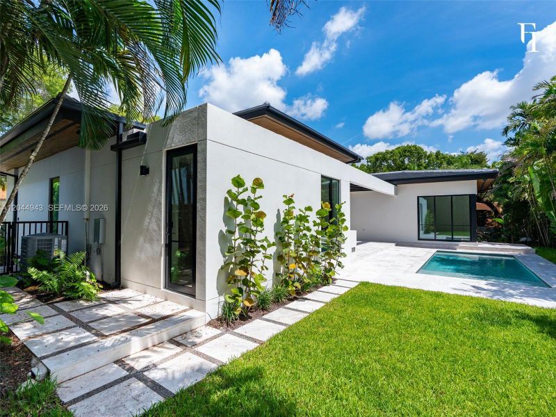 Exterior details and patio area of a home in , Coral Gables (Image 35). Exterior details and patio area of a home in , Coral Gables (Image 35).