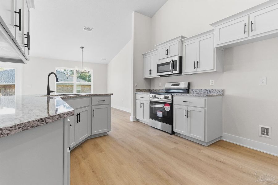 Furnished interior view inside a new home in Pecan Valley, Pensacola (Image 4).