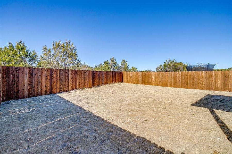 Exterior details and patio area of a home in , Granbury (Image 25). Exterior details and patio area of a home in , Granbury (Image 25).