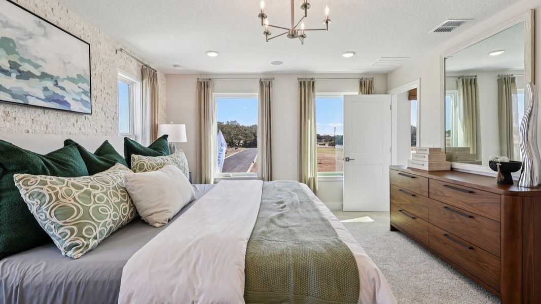 The Mangrove Model Primary Suite at Lakeside at Satilla by DRB Homes in Saint Cloud, FL