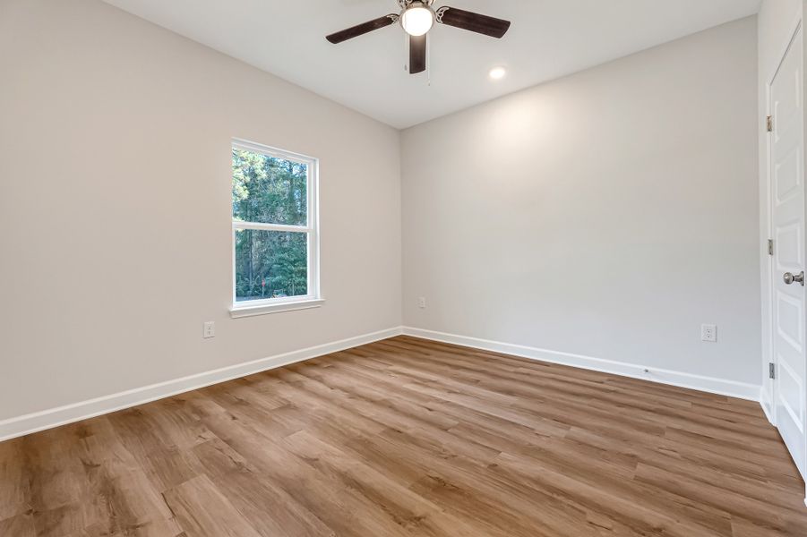 Spacious, unfurnished interior of a new home in Southern Charm, Crestview (Image 30).