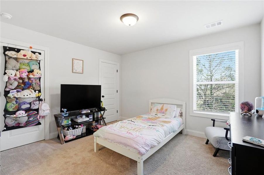 Furnished interior view inside a new home in Calgary Downs, Winder (Image 18).
