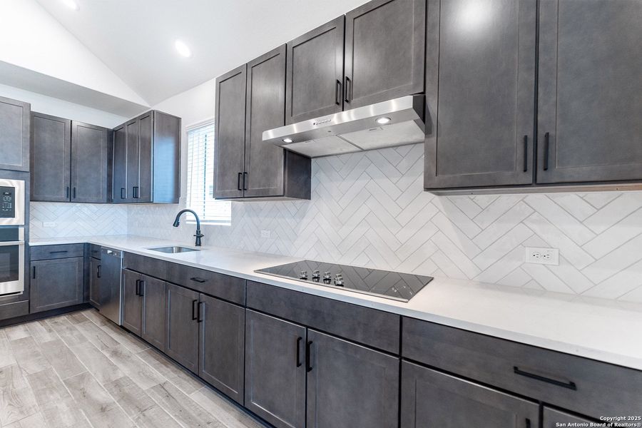 Furnished interior view inside a new home in The Woodlands at Medina Hills, Mico (Image 10).