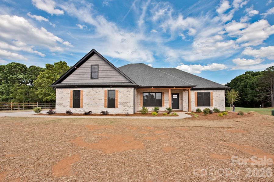 Front exterior of a new home in , China Grove, NC, highlighting curb appeal (Image 20).