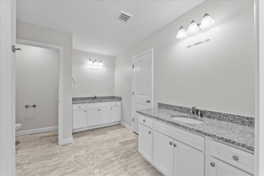 Representative furnished interior of a home built from the Addington by Enchanted Homes in Davis Heights, Inman (Image 35).