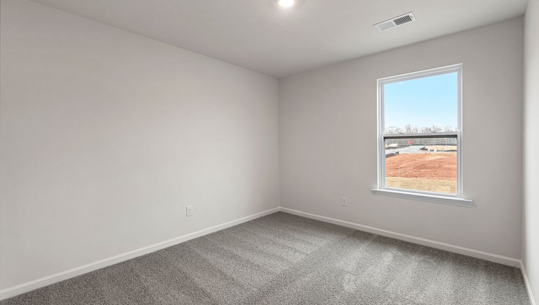 Representative unfurnished interior of a home built from the Belhaven by D.R. Horton in Lakestone, Woodruff (Image 17).