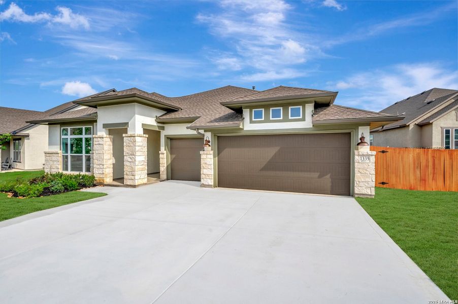 Front exterior of a new home in Meyer Ranch – Legacy Series, New Braunfels, TX, highlighting curb appeal (Image 26).
