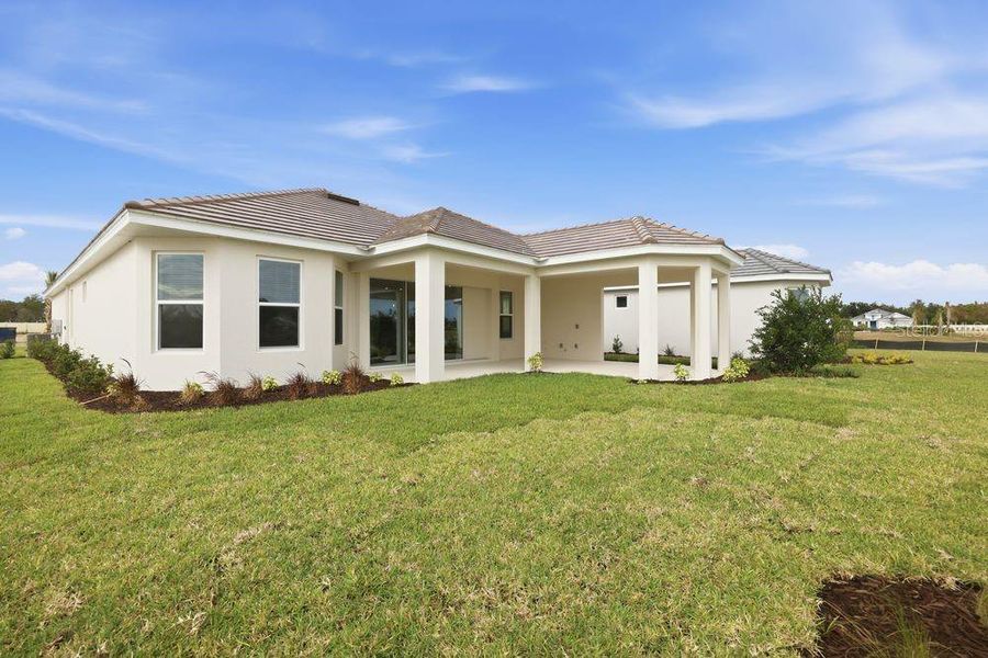 Exterior details and patio area of a home in Esplanade at Wiregrass Ranch, Wesley Chapel (Image 28).