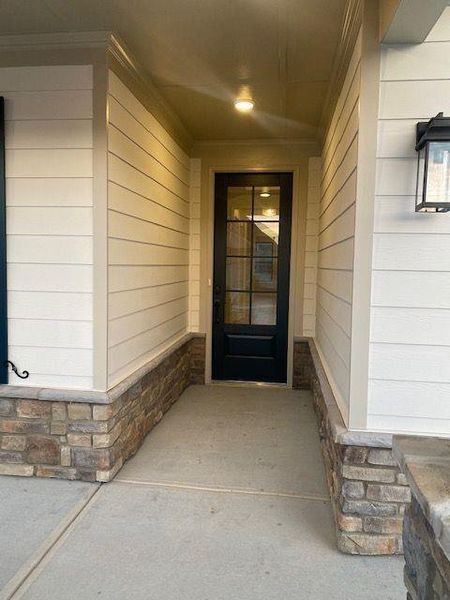 Exterior details and patio area of a home in Soleil Summit Chase, Snellville (Image 4).
