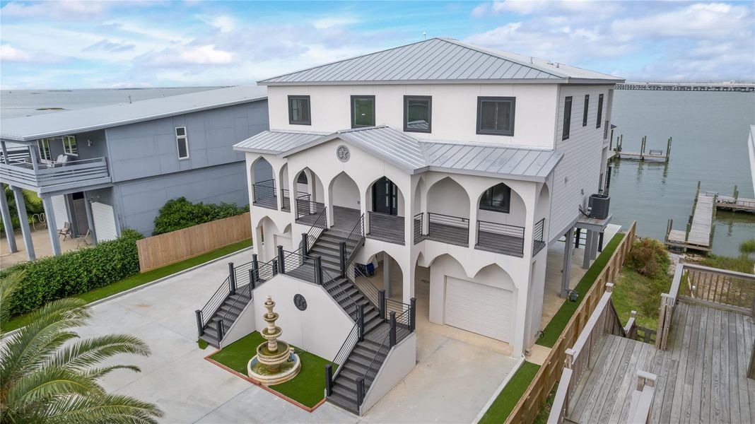 Front exterior of a new home in , Galveston, TX, highlighting curb appeal (Image 19). Front exterior of a new home in , Galveston, TX, highlighting curb appeal (Image 19).
