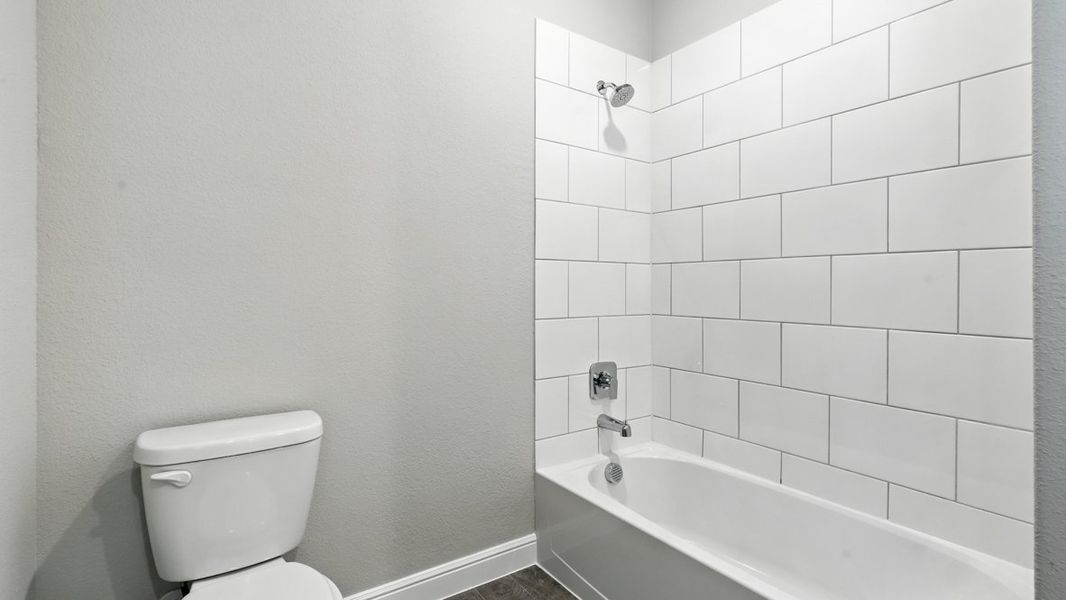 Representative furnished interior of a home built from the Bridge City by D.R. Horton in Retta Estates, Mansfield (Image 9).