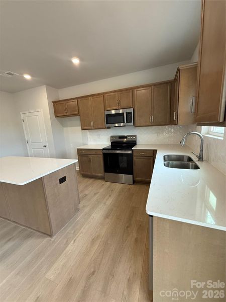 Furnished interior view inside a new home in Piper Creek, Newton (Image 6).