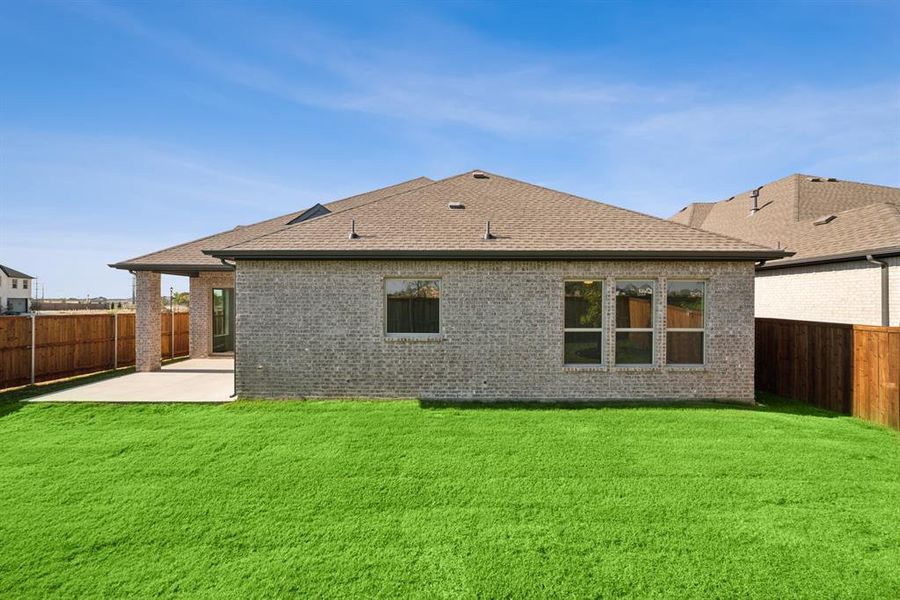 Exterior details and patio area of a home in Wellington, Haslet (Image 24).