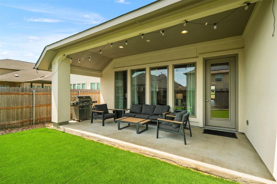 Front exterior of a new home in Santa Rita Ranch 50', Liberty Hill, TX, highlighting curb appeal (Image 21). Front exterior of a new home in Santa Rita Ranch 50', Liberty Hill, TX, highlighting curb appeal (Image 21).