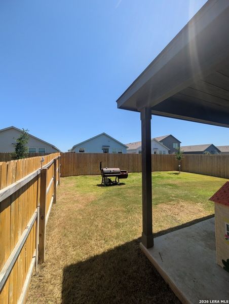 Exterior details and patio area of a home in Rose Valley, Converse (Image 2).