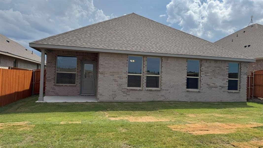 Front exterior of a new home in Morningstar, Fort Worth, TX, highlighting curb appeal (Image 2).