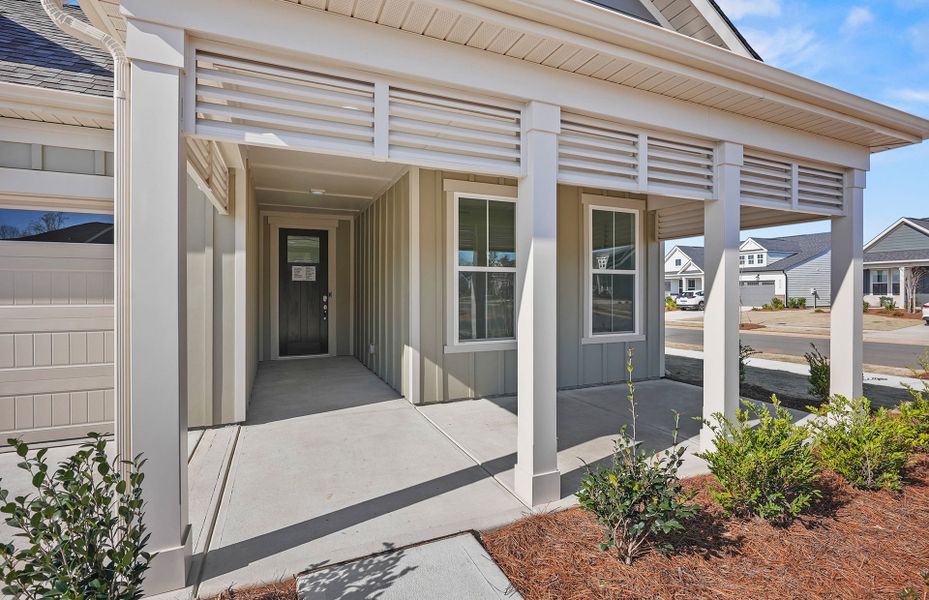 Exterior details and patio area of a home in Carolina Riverside, Belmont (Image 26).