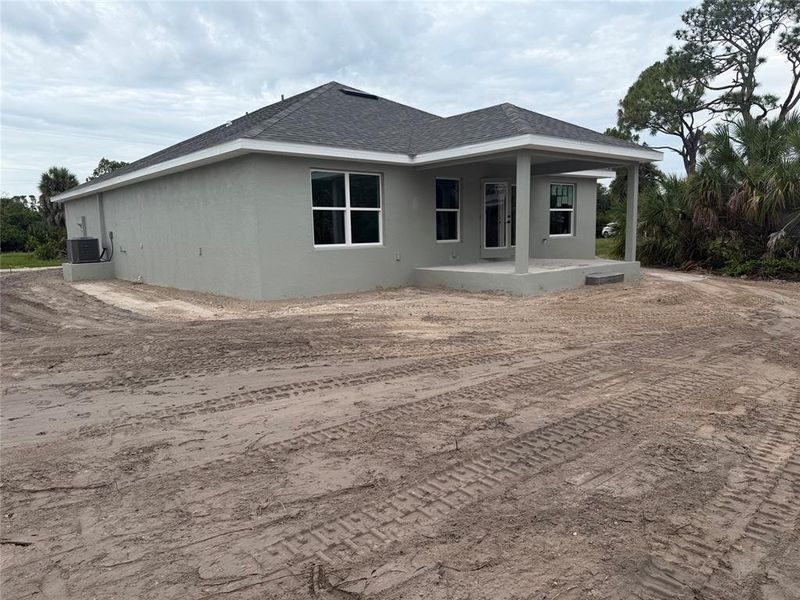 Exterior details and patio area of a home in , Port Charlotte (Image 2). Exterior details and patio area of a home in , Port Charlotte (Image 2).