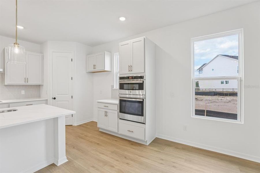 Furnished interior view inside a new home in Weslyn Park Single Family, St. Cloud (Image 9).