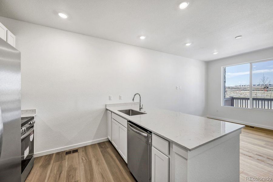 Furnished interior view inside a new home in Parterre, Thornton (Image 5).