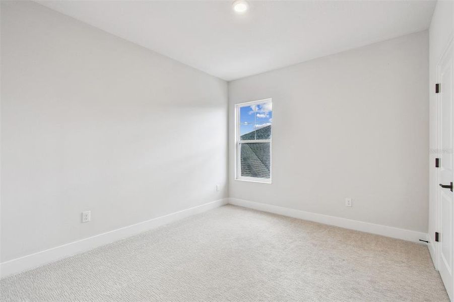 Spacious, unfurnished interior of a new home in Emerald Landing at Waterside at Lakewood Ranch – Lake Series, Sarasota (Image 15).