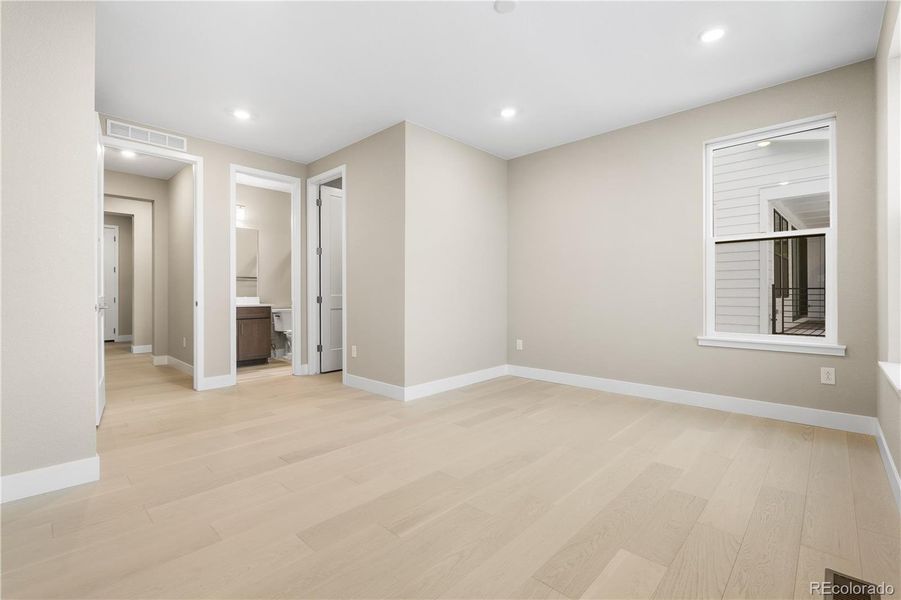Spacious, unfurnished interior of a new home in Autograph at Lyric, Lone Tree (Image 39).