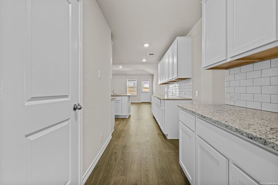 Furnished interior view inside a new home in Redbird Ranch, San Antonio (Image 8).