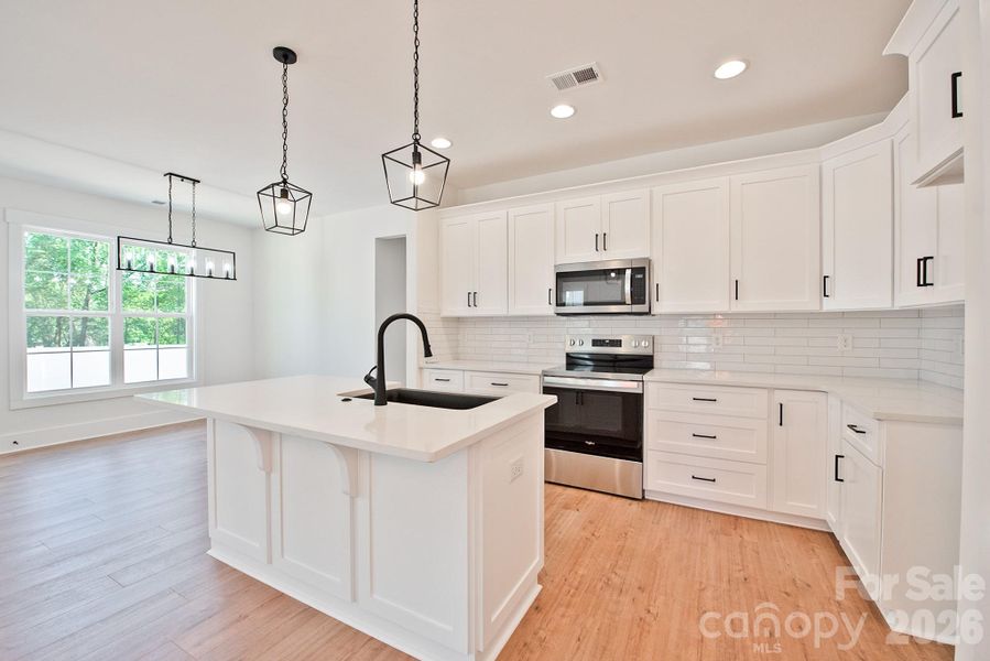 Furnished interior view inside a new home in , Concord (Image 6).