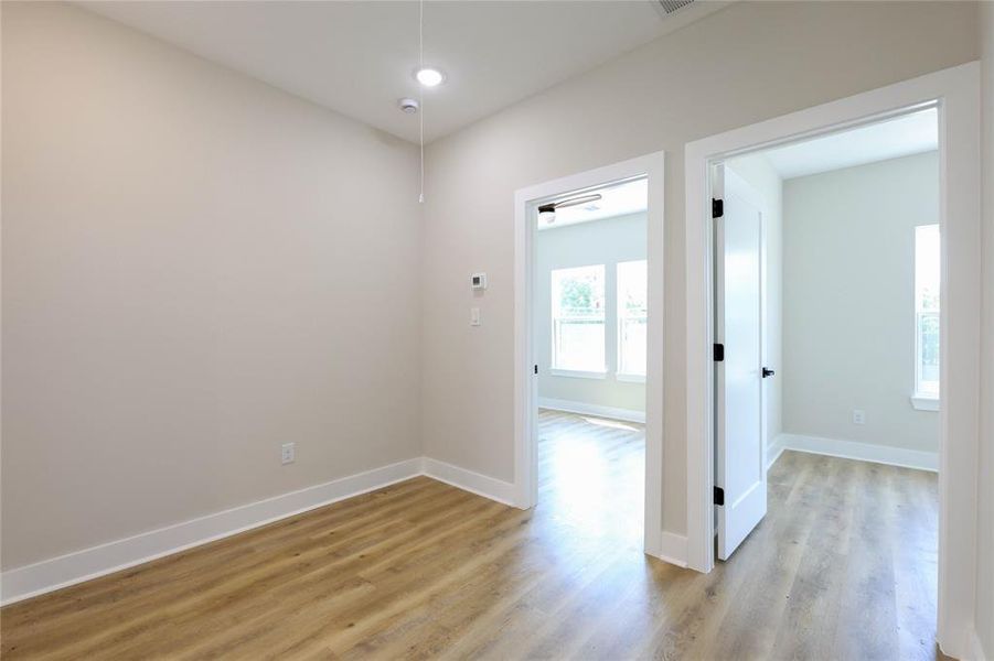 Sitting nook could be used as a decorative space or WFH office area.