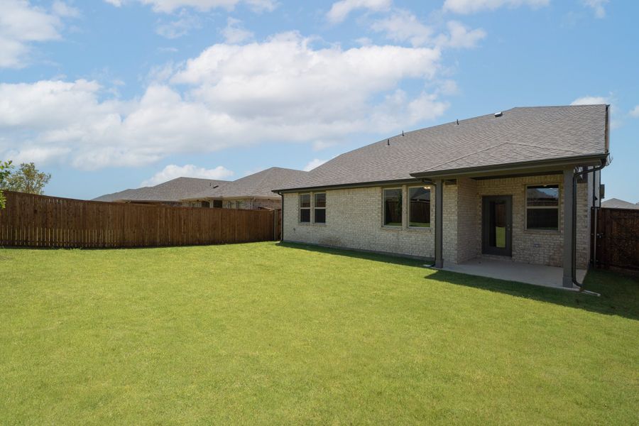 Exterior details and patio area of a home in Lake Pointe, Little Elm (Image 2).