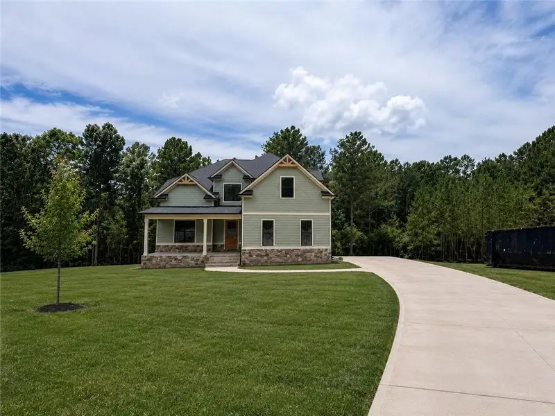 Front exterior of a new home in , Rome, GA, highlighting curb appeal (Image 1). Front exterior of a new home in , Rome, GA, highlighting curb appeal (Image 1).