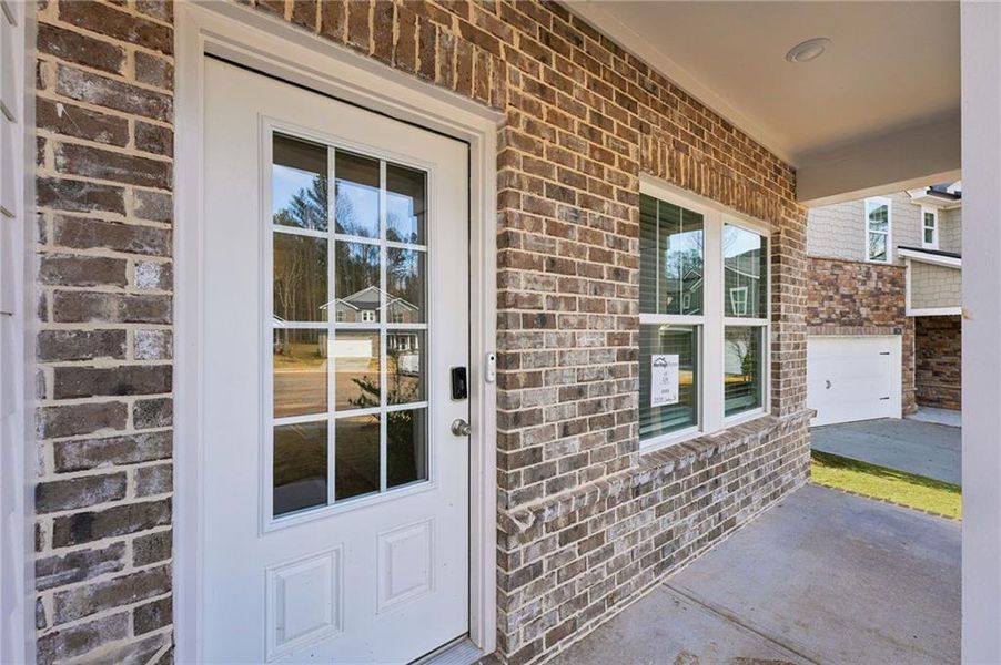 Exterior details and patio area of a home in Westmont Preserve, Powder Springs (Image 3).