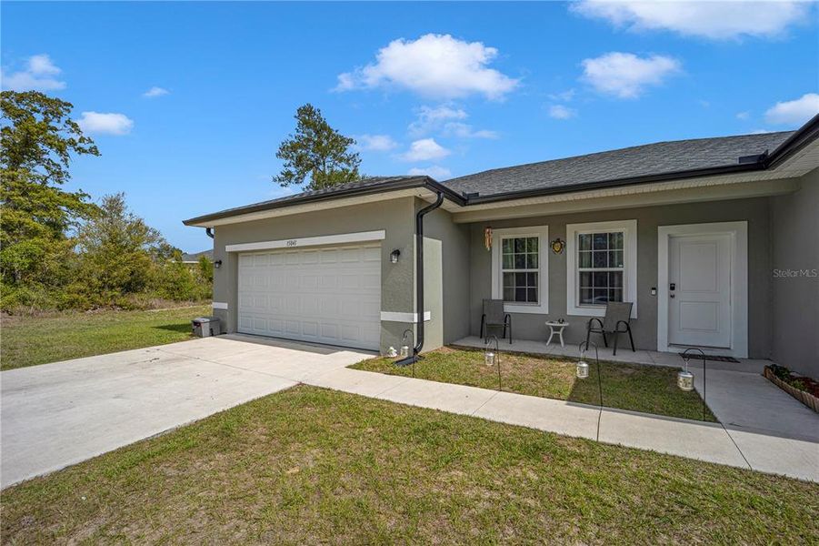 Front exterior of a new home in , Ocala, FL, highlighting curb appeal (Image 1). Front exterior of a new home in , Ocala, FL, highlighting curb appeal (Image 1).