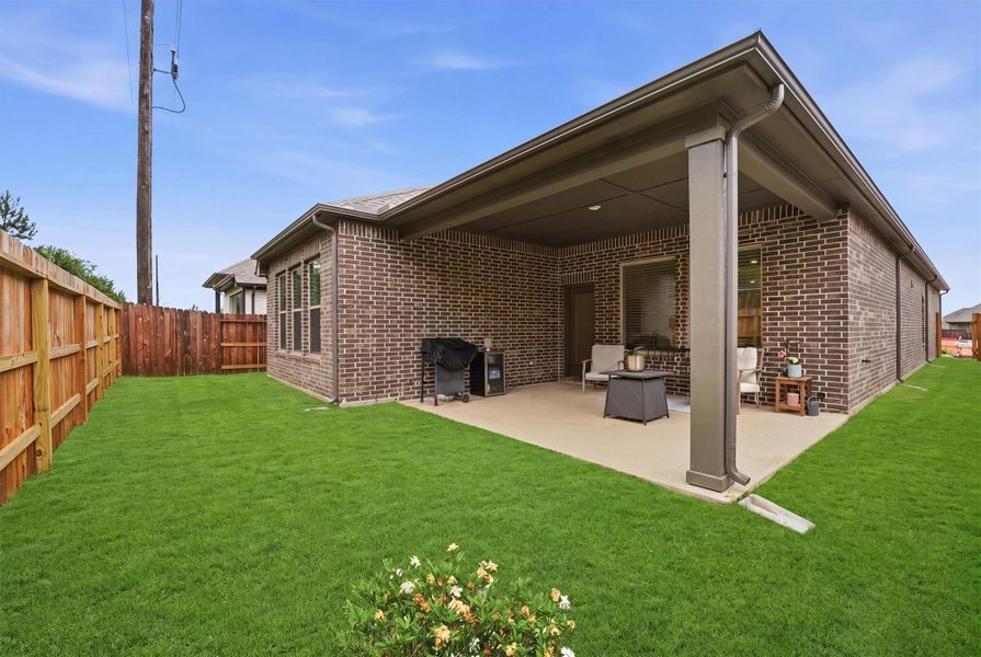 Four-sided brick home, rain gutters all around the home