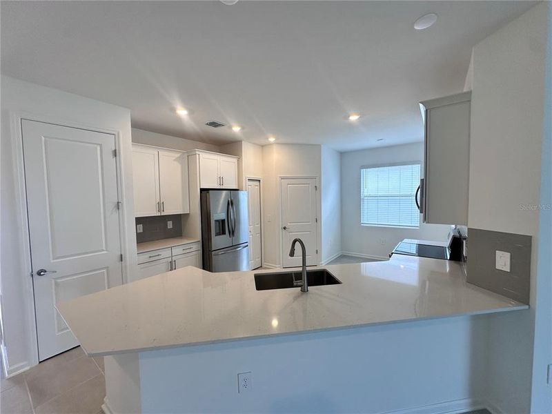 Furnished interior view inside a new home in Bridgewalk, St. Cloud (Image 10).