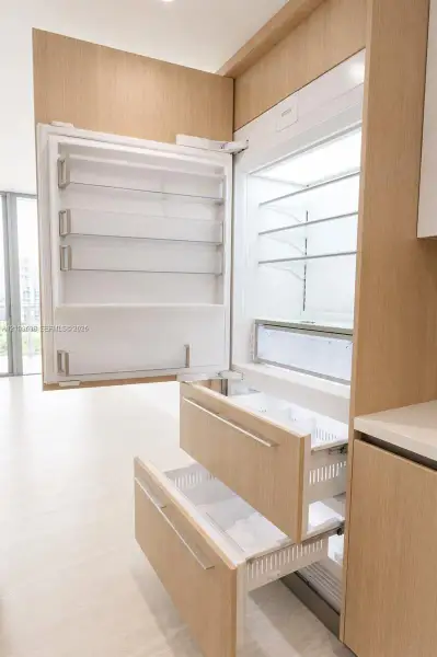 Furnished interior view inside a new home in , North Miami (Image 12).