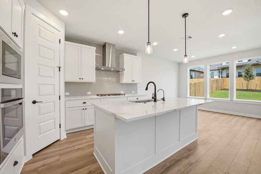 Furnished interior view inside a new home in Heritage, Dripping Springs (Image 10).