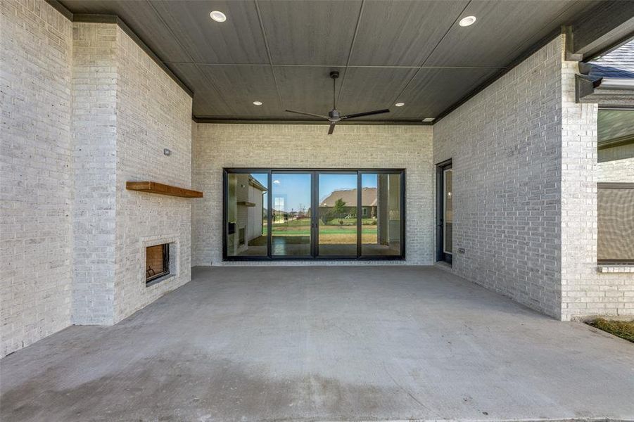 View of patio with ceiling fan