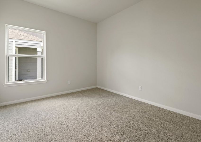 Secondary bedroom with lush carpet flooring Secondary bedroom with lush carpet flooring