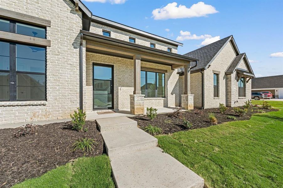 Exterior details and patio area of a home in NorthGlen, Haslet (Image 3).