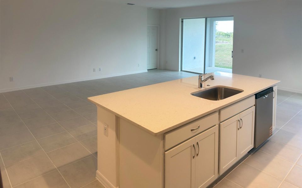 Furnished interior view inside a new home in Eagletail Landings, Howey-in-the-Hills (Image 6).