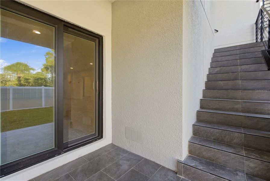 Exterior details and patio area of a home in , New Port Richey (Image 30).