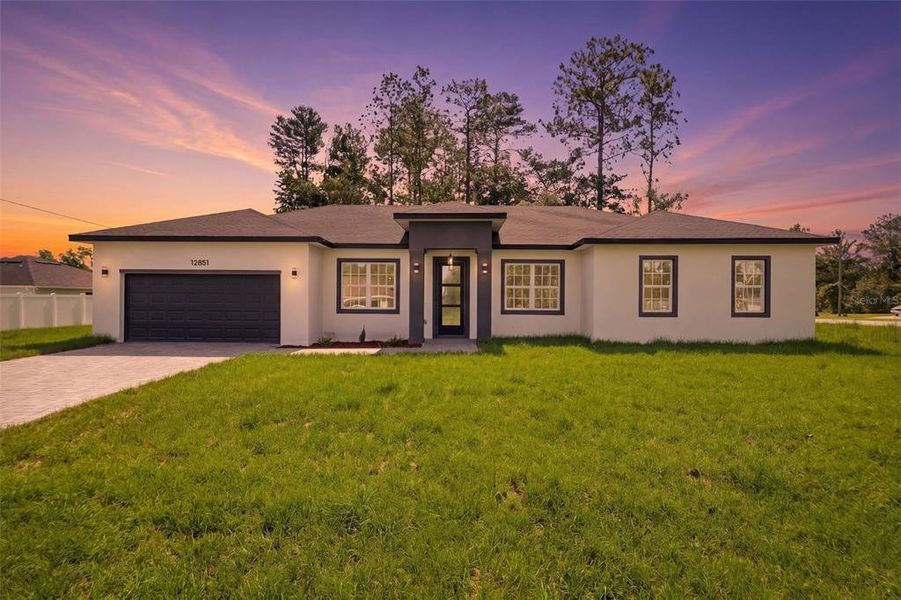 Front exterior of a new home in , Ocala, FL, highlighting curb appeal (Image 2). Front exterior of a new home in , Ocala, FL, highlighting curb appeal (Image 2).