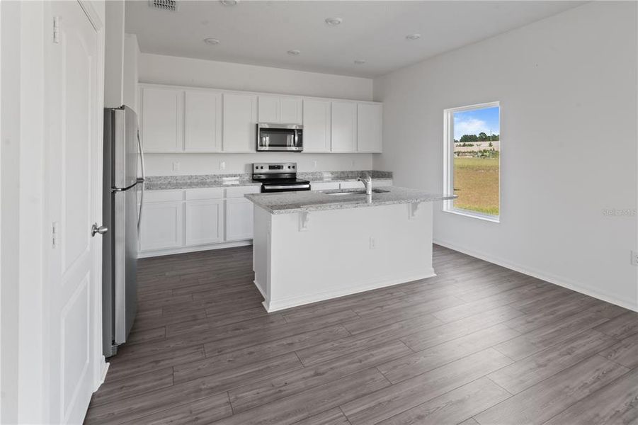 Furnished interior view inside a new home in Peach Crossings, Winter Haven (Image 7).