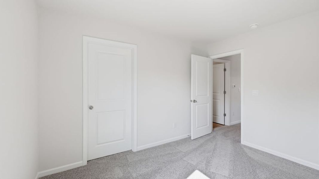 Spacious, unfurnished interior of a new home in Cedar Gap, Fountain Inn (Image 27). Spacious, unfurnished interior of a new home in Cedar Gap, Fountain Inn (Image 27).