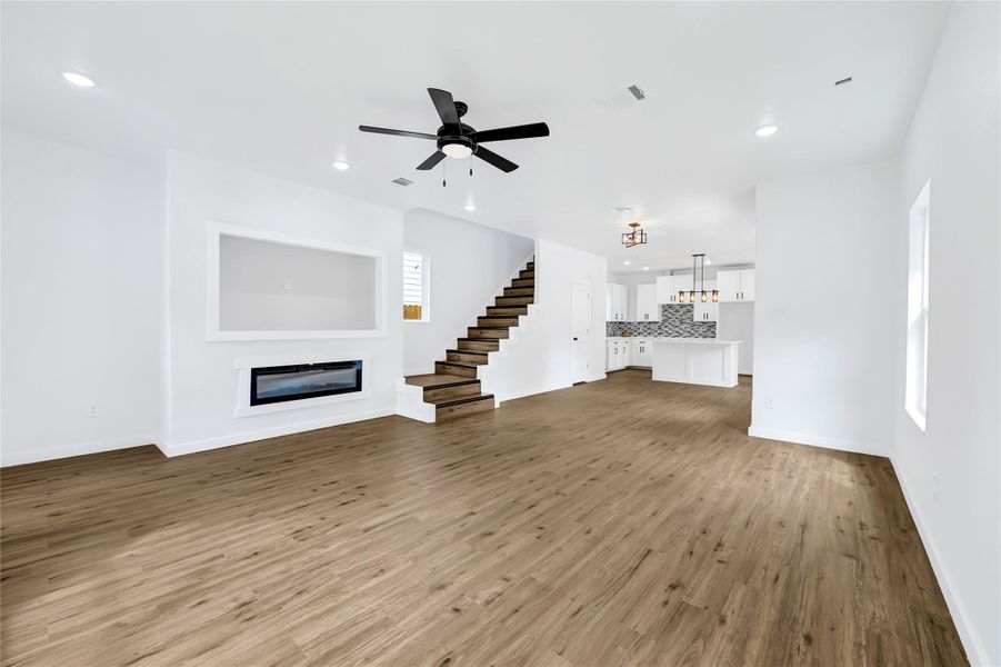 Open-concept layout connects seamlessly to kitchen and dining. Open-concept layout connects seamlessly to kitchen and dining.