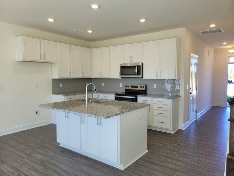 Furnished interior view inside a new home in 1158 Place Townhomes, Wilson (Image 5). Furnished interior view inside a new home in 1158 Place Townhomes, Wilson (Image 5).